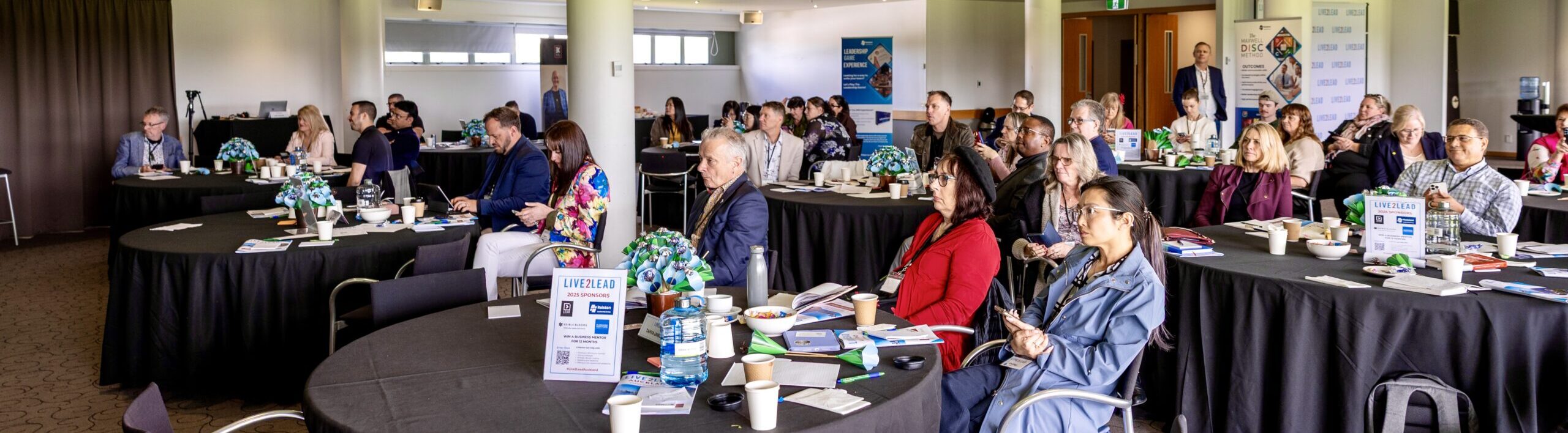 Conference audience at a leadership event